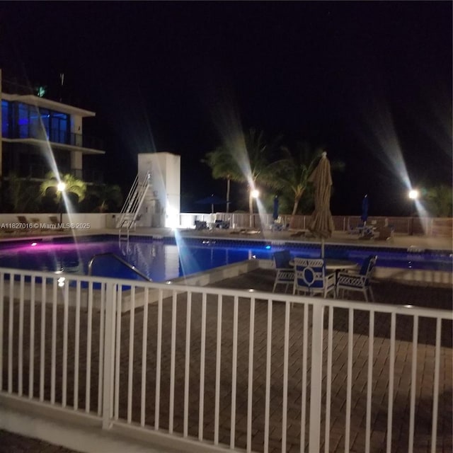2101 S Ocean Dr Unit 2603, Hollywood, FL 33019 - pool at twilight with a community pool and a patio area