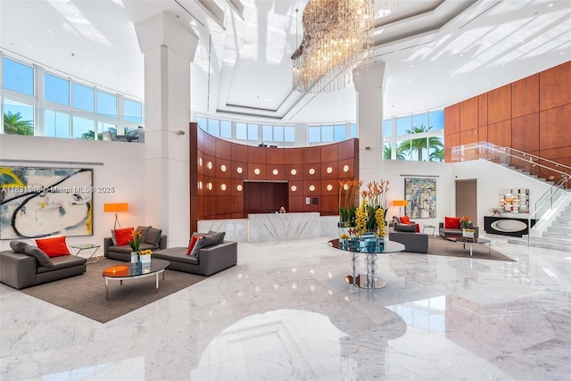 19111 Collins Ave Unit 801, Sunny Isles Beach, FL 33160 - common area featuring a high ceiling and stairs