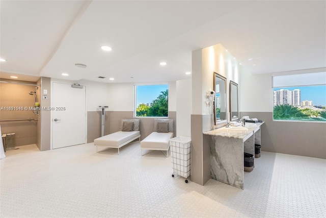 19111 Collins Ave Unit 801, Sunny Isles Beach, FL 33160 - bathroom featuring plenty of natural light, vanity, recessed lighting, and tile patterned floors