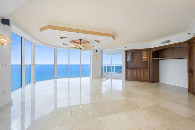 19111 Collins Ave Unit 801, Sunny Isles Beach, FL 33160 - empty room featuring crown molding, a wall of windows, a water view, and ceiling fan