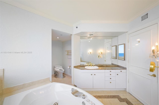 19111 Collins Ave Unit 801, Sunny Isles Beach, FL 33160 - bathroom featuring vanity, a jetted tub, tile patterned flooring, and ornamental molding
