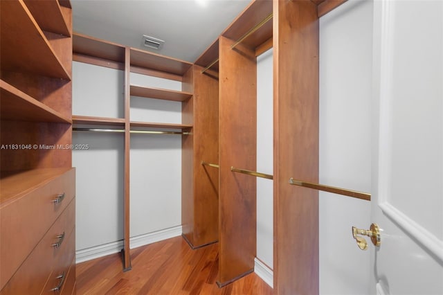 19111 Collins Ave Unit 801, Sunny Isles Beach, FL 33160 - spacious closet with wood finished floors