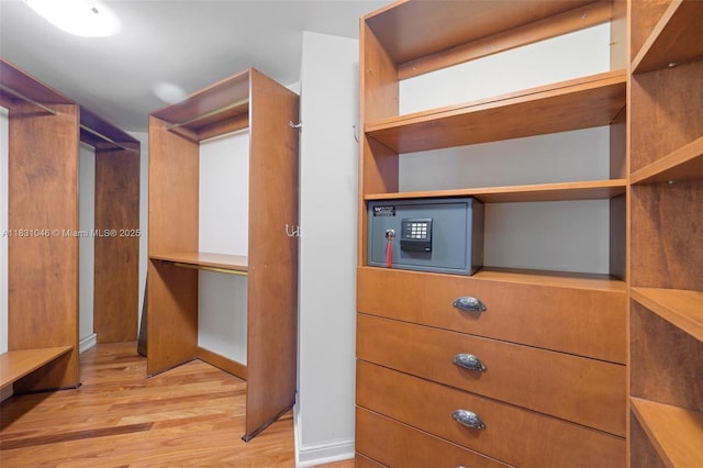 19111 Collins Ave Unit 801, Sunny Isles Beach, FL 33160 - walk in closet with light wood-style flooring