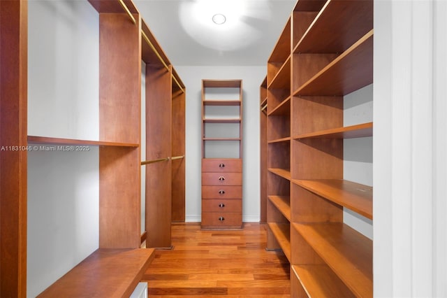 19111 Collins Ave Unit 801, Sunny Isles Beach, FL 33160 - walk in closet with light wood finished floors