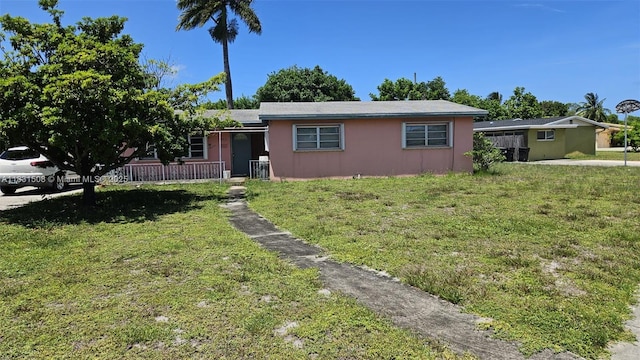 1143 NW 18th St, Fort Lauderdale, FL 33311 - ranch-style house with a front yard
