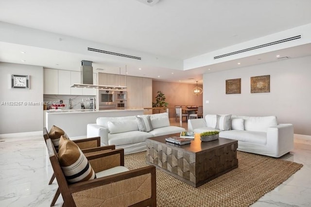 15701 Collins Ave Unit 2902, Sunny Isles Beach, FL 33160 - living area with light marble finish floors and recessed lighting