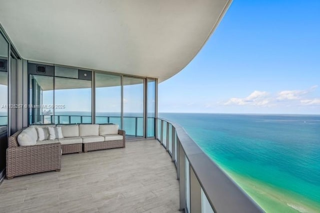 15701 Collins Ave Unit 2902, Sunny Isles Beach, FL 33160 - balcony with a water view and an outdoor hangout area