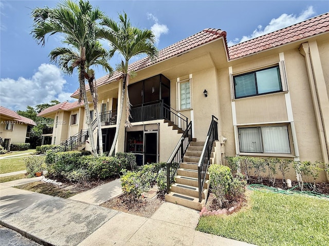 318 Lakeview Dr Unit 203, Weston, FL 33326 - view of building exterior featuring stairway