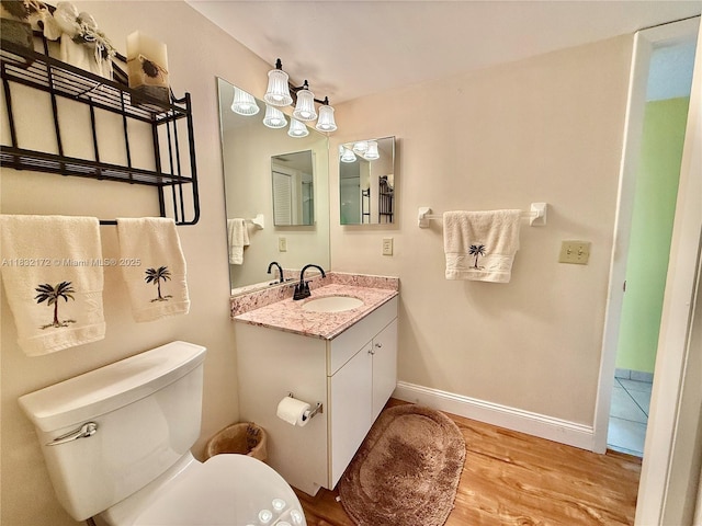 318 Lakeview Dr Unit 203, Weston, FL 33326 - bathroom featuring vanity and wood finished floors