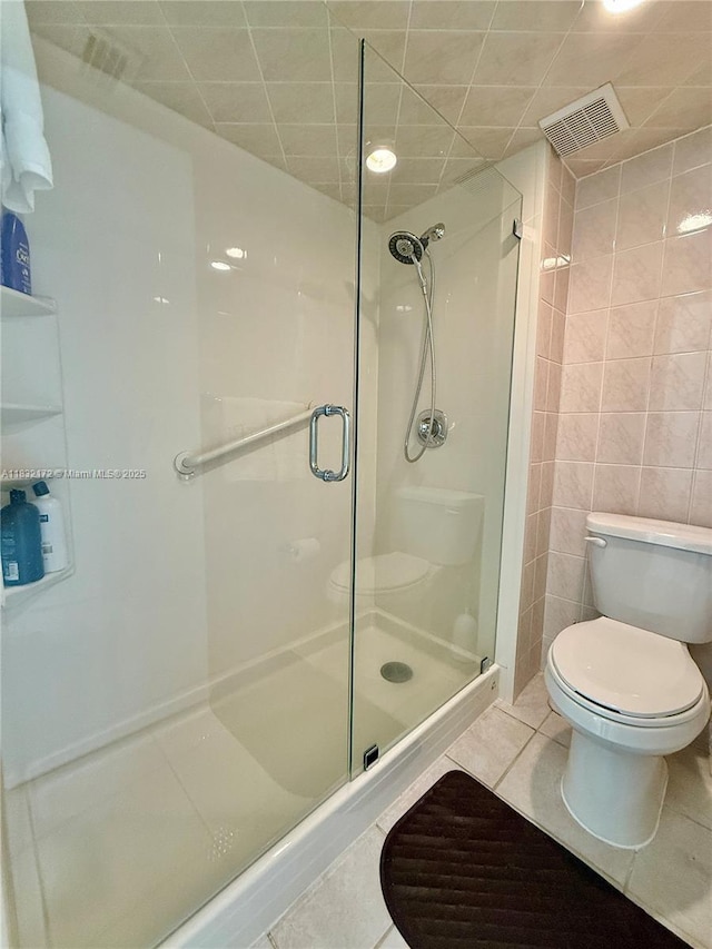 318 Lakeview Dr Unit 203, Weston, FL 33326 - full bathroom with a stall shower, tile patterned flooring, and tile walls