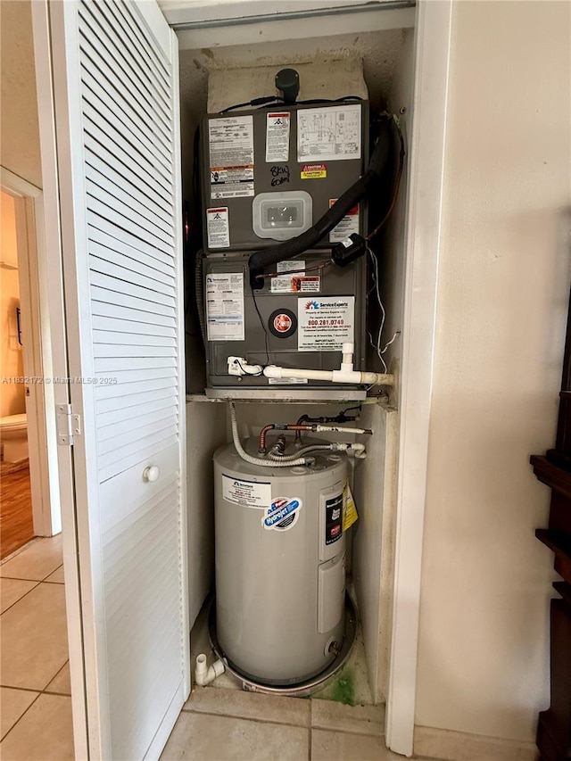 318 Lakeview Dr Unit 203, Weston, FL 33326 - utility room featuring water heater