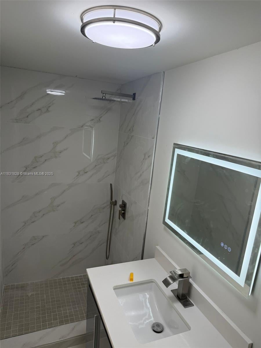 11865 SW 186th St, Miami, FL 33177 - full bath with vanity and a marble finish shower