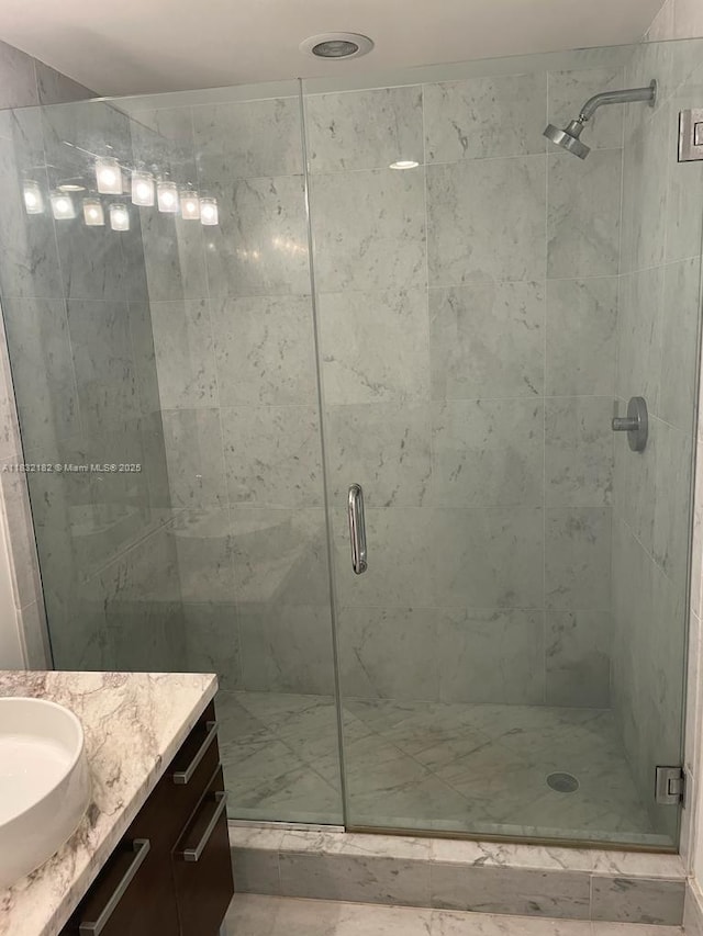 253 NE 2nd St Unit 2806, Miami, FL 33132 - bathroom featuring vanity and a stall shower