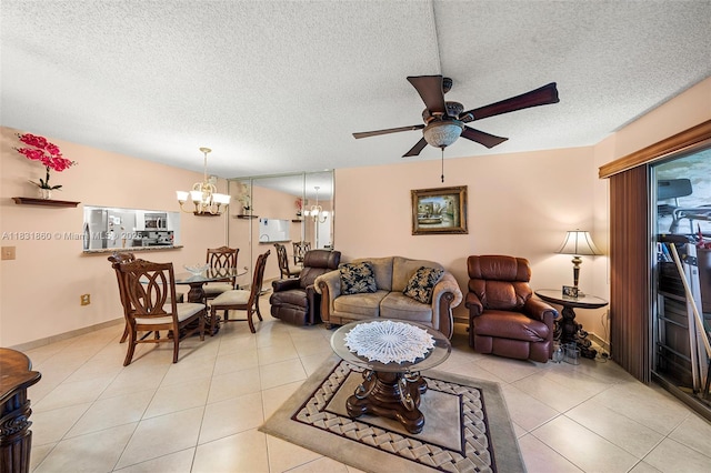 1601 SW 128th Ter Unit 209A, Pembroke Pines, FL 33027 - living area with a chandelier, a ceiling fan, a textured ceiling, and light tile patterned floors