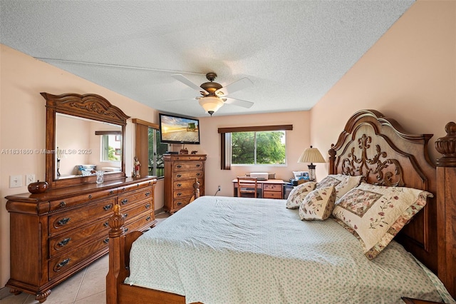 1601 SW 128th Ter Unit 209A, Pembroke Pines, FL 33027 - bedroom with a textured ceiling and a ceiling fan