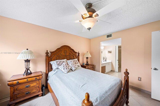 1601 SW 128th Ter Unit 209A, Pembroke Pines, FL 33027 - bedroom featuring light tile patterned floors, a ceiling fan, and a textured ceiling