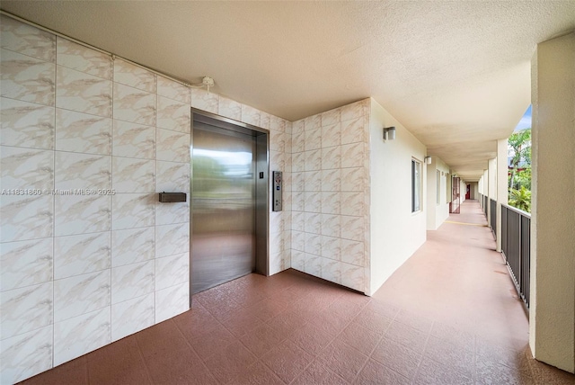 1601 SW 128th Ter Unit 209A, Pembroke Pines, FL 33027 - hall featuring elevator