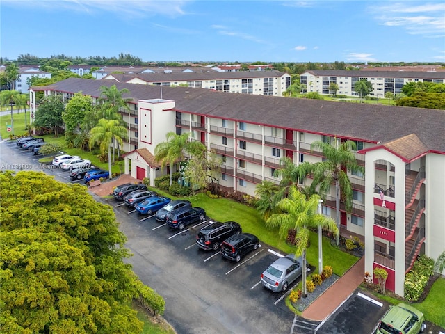 1601 SW 128th Ter Unit 209A, Pembroke Pines, FL 33027 - view of apartment building / complex featuring uncovered parking