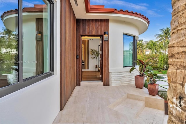 9448 Abbott Ave, Surfside, FL 33154 - property entrance featuring a tile roof