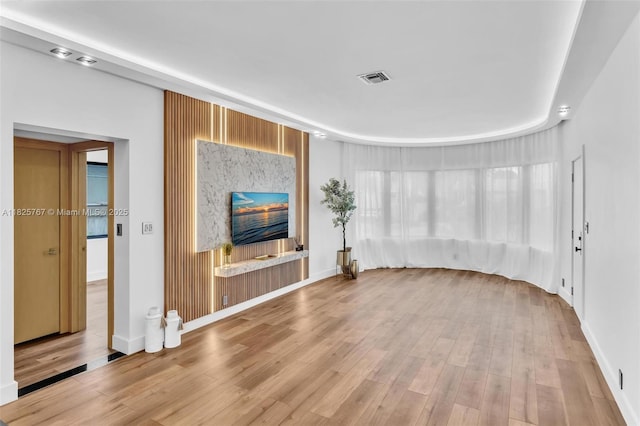 9448 Abbott Ave, Surfside, FL 33154 - unfurnished living room with wood finished floors and baseboards