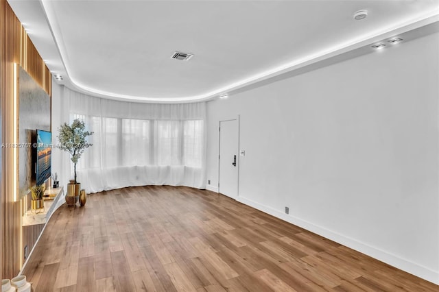 9448 Abbott Ave, Surfside, FL 33154 - unfurnished living room featuring light wood-type flooring