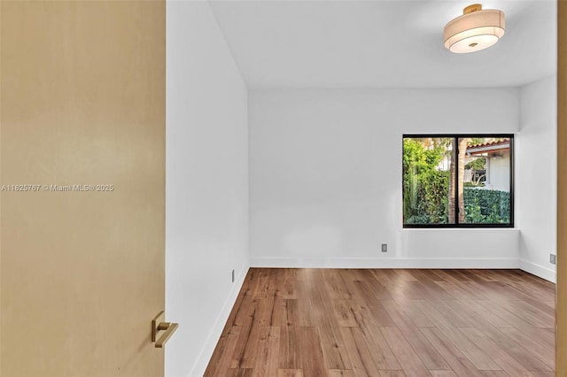 9448 Abbott Ave, Surfside, FL 33154 - unfurnished room with wood finished floors