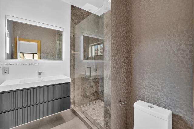 9448 Abbott Ave, Surfside, FL 33154 - bathroom with a stall shower and vanity
