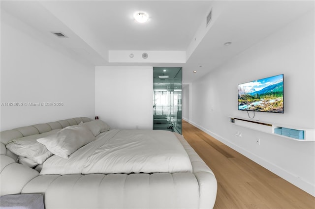 1100 Biscayne Blvd Unit 4305, Miami, FL 33132 - bedroom featuring light wood-style flooring and recessed lighting