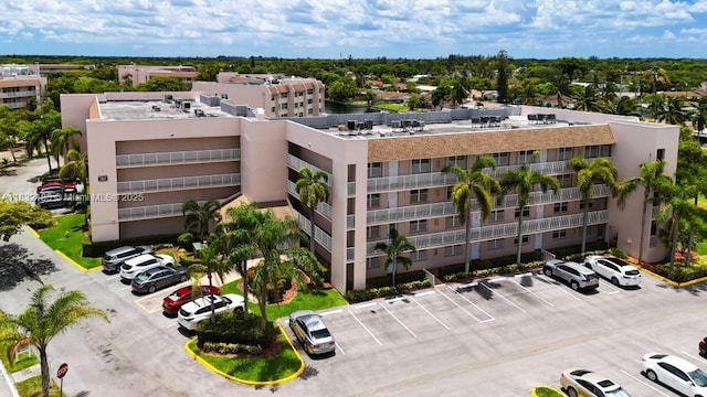 2607 NW 104th Ave Unit 206, Sunrise, FL 33322 - view of apartment building / complex featuring uncovered parking