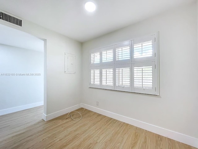 2607 NW 104th Ave Unit 206, Sunrise, FL 33322 - spare room featuring plenty of natural light, light wood-style flooring, and electric panel