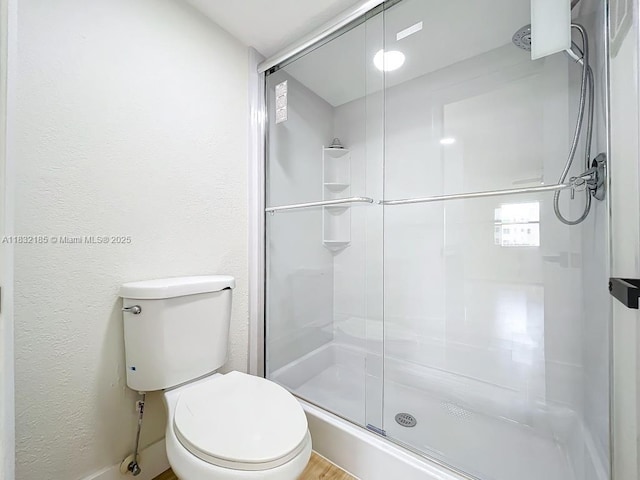 2607 NW 104th Ave Unit 206, Sunrise, FL 33322 - full bathroom with a stall shower and toilet