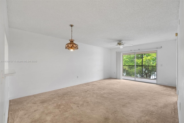 13701 SW 12th St Unit 405A, Pembroke Pines, FL 33027 - unfurnished room with carpet flooring, a ceiling fan, and a textured ceiling