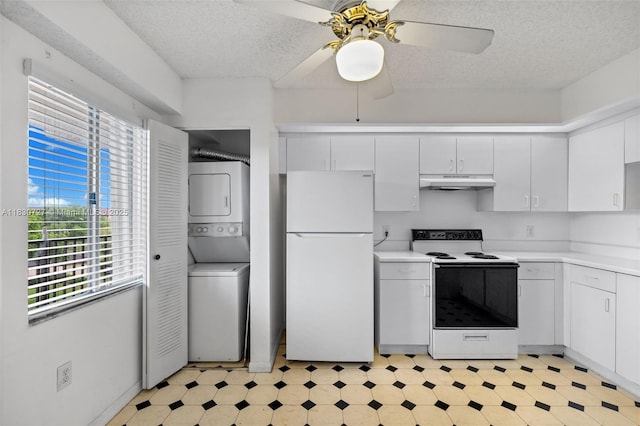 13701 SW 12th St Unit 405A, Pembroke Pines, FL 33027 - kitchen with white appliances, under cabinet range hood, stacked washer / dryer, light flooring, and a textured ceiling