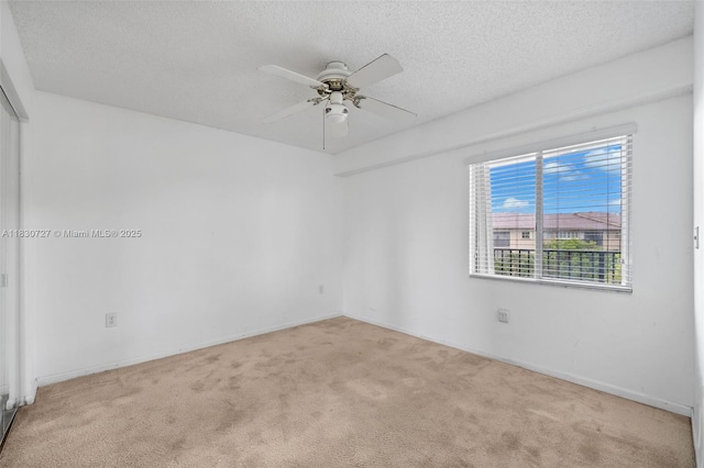 13701 SW 12th St Unit 405A, Pembroke Pines, FL 33027 - carpeted empty room featuring ceiling fan and a textured ceiling