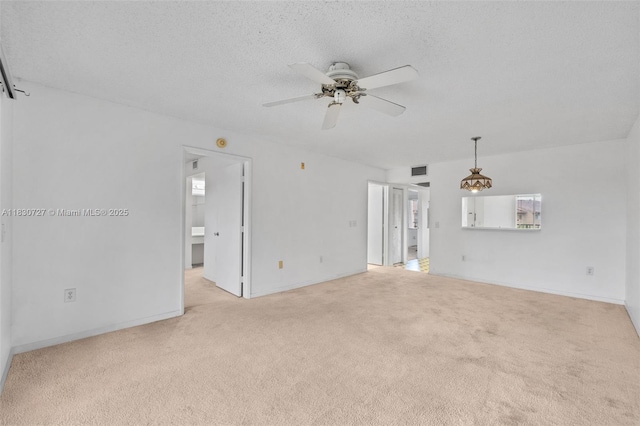 13701 SW 12th St Unit 405A, Pembroke Pines, FL 33027 - carpeted spare room featuring a ceiling fan and a textured ceiling