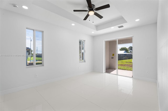 217 N Macedo Blvd, Port St Lucie, FL 34983 - unfurnished room featuring healthy amount of natural light, recessed lighting, a ceiling fan, a raised ceiling, and a smoke detector