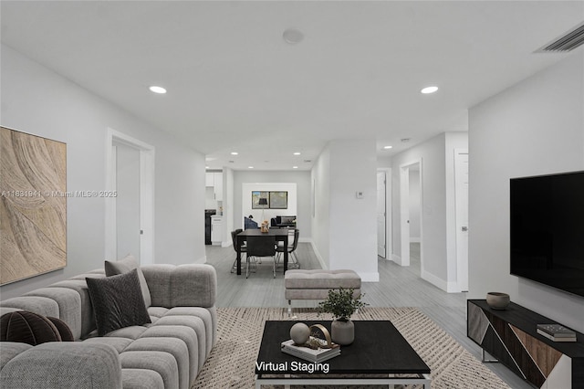 212 SW 11th Ave, Dania Beach, FL 33004 - living room with wood finished floors and recessed lighting