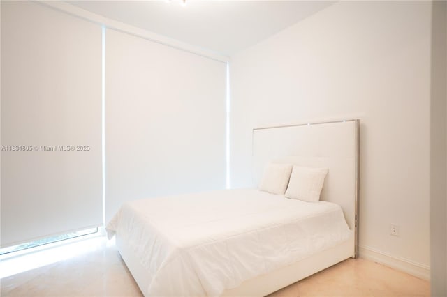 18101 Collins Ave Unit 701, Sunny Isles Beach, FL 33160 - bedroom with baseboards