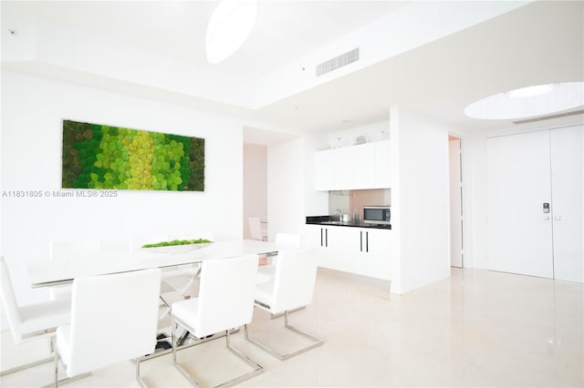 18101 Collins Ave Unit 701, Sunny Isles Beach, FL 33160 - dining space featuring light tile patterned floors