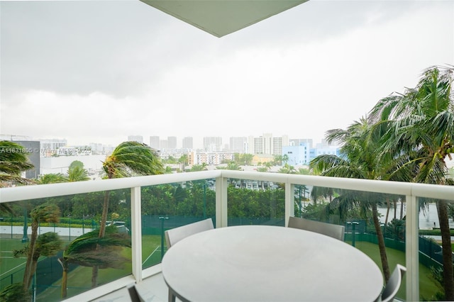 18101 Collins Ave Unit 701, Sunny Isles Beach, FL 33160 - balcony featuring a view of city and outdoor dining space
