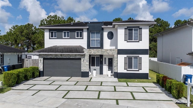 18350 SW 139th Path, Miami, FL 33177 - view of front of house featuring stone siding, driveway, and stucco siding