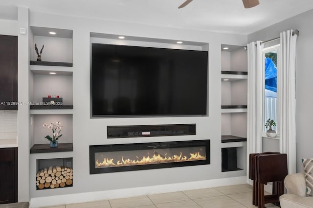 18350 SW 139th Path, Miami, FL 33177 - tiled living area with built in shelves, a glass covered fireplace, and ceiling fan