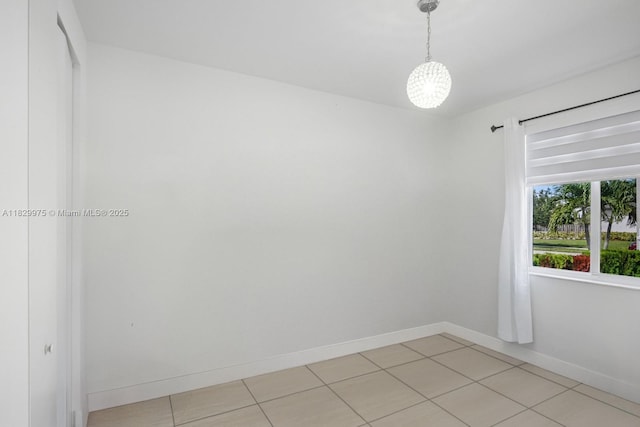 18350 SW 139th Path, Miami, FL 33177 - spare room with baseboards and light tile patterned floors