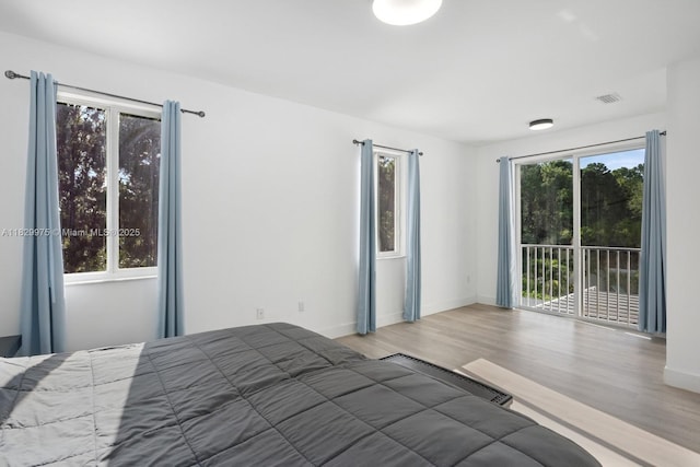 18350 SW 139th Path, Miami, FL 33177 - bedroom featuring access to outside and wood finished floors