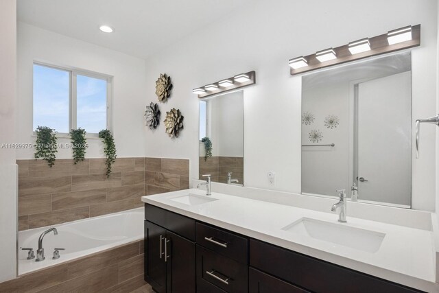 18350 SW 139th Path, Miami, FL 33177 - full bath featuring double vanity, a bath, and recessed lighting