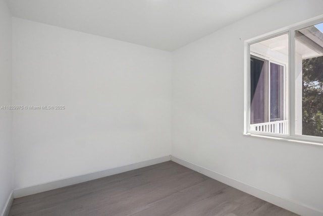 18350 SW 139th Path, Miami, FL 33177 - spare room with wood finished floors and baseboards