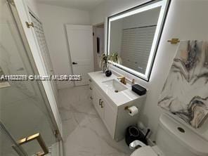 11350 SW 132nd Ct, Miami, FL 33186 - full bath featuring vanity, a shower stall, and marble finish flooring
