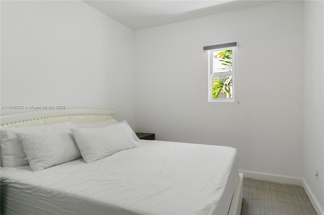 1560 Meridian Ave Unit 108, Miami Beach, FL 33139 - bedroom with baseboards and carpet