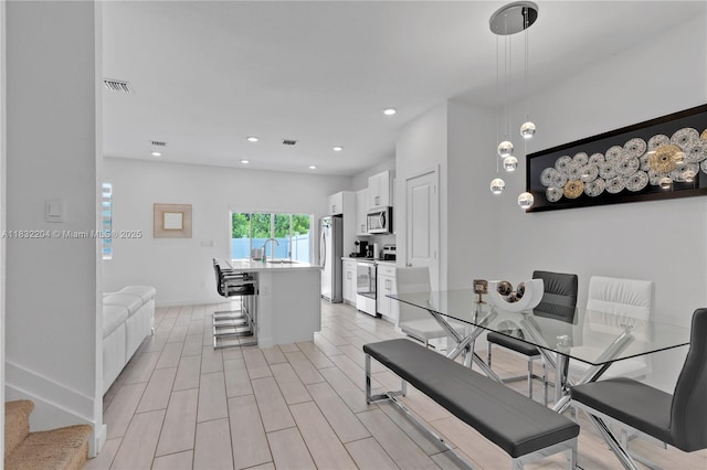 814 SE 19th St Unit 814, Homestead, FL 33034 - dining room with baseboards and recessed lighting
