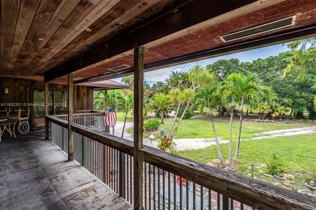 576 Marshall Rd, West Palm Beach, FL 33413 - wooden deck with a lawn